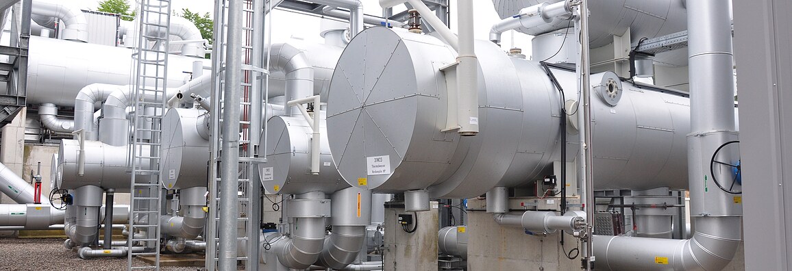 heat exchangers in a geothermal plant. These heat exchangers transfer heat from the geothermal fluid to another circuits.