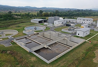 A modern facility designed to treat and purify municipal wastewater, featuring sedimentation tanks, aeration basins, and advanced treatment units to ensure environmental protection and water quality.