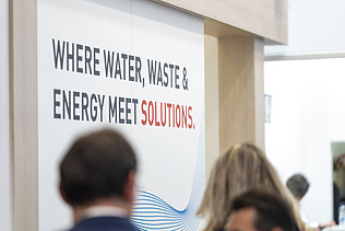 A focused shot highlighting the core message of the exhibition booth: 