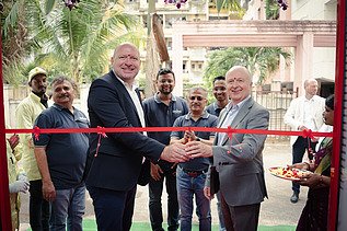 Christian Sadleder and Norbert Hofmann cut the red ribbon in India 