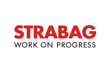 STRABAG logo displayed on a light grey background, featuring the company name in red uppercase letters with the slogan “WORK ON PROGRESS” in black below.