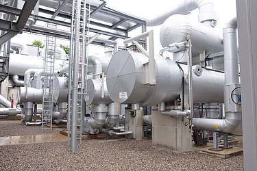 heat exchangers in a geothermal plant. These heat exchangers transfer heat from the geothermal fluid to another circuit